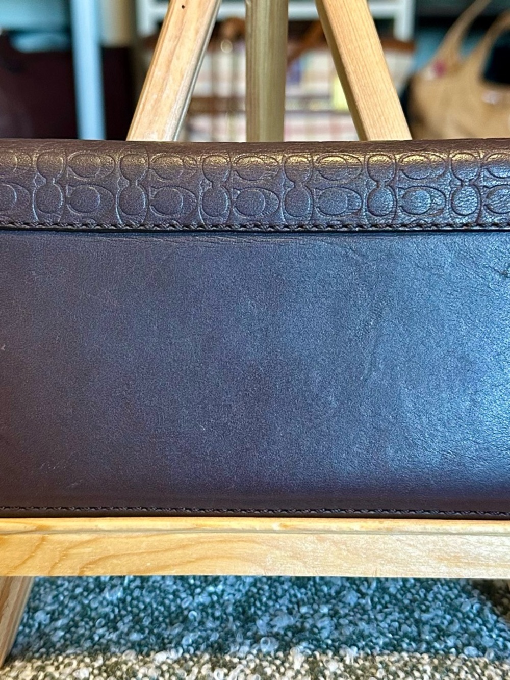 Coach Unisex Embossed leather wallet in Taupe.